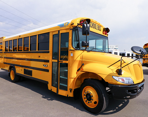 yellow school bus in a parking lot